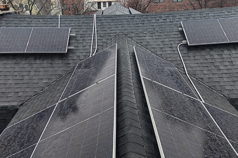 solar panels on rooftop with clear pathways