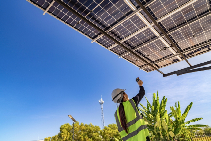 solar panel contractor making sure solar panels are working